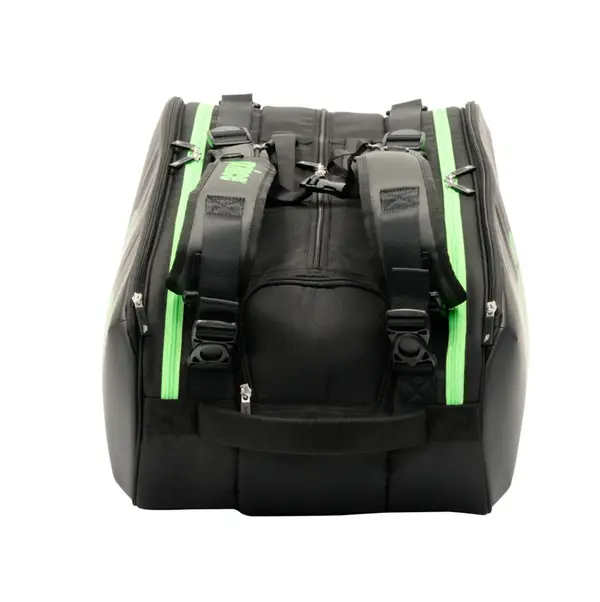 Black duffel bag with bright green zipper accents and multiple straps, viewed from the top.