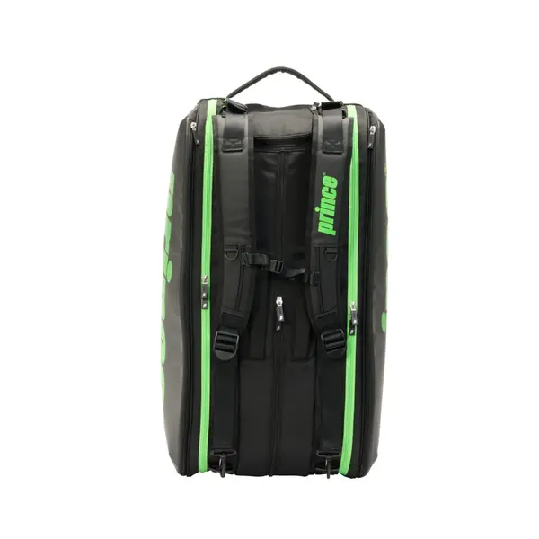 Black luggage-style backpack with bright green zippers and trim, viewed from the back showing padded shoulder straps and a top handle.
