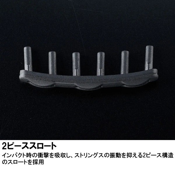 Black curved plastic component with five vertical posts on a dark background, likely a dampening or support piece.