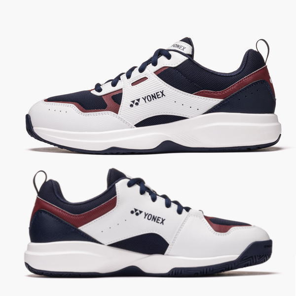 Pair of Yonex athletic sneakers: white uppers with navy and burgundy accents, shown from side and angle views.