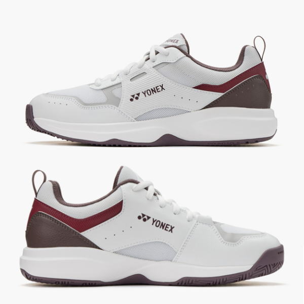 Pair of Yonex white athletic sneakers with burgundy and brown accents, shown in side profiles (two views).