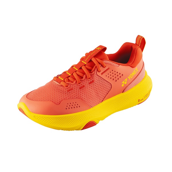 Bright orange athletic shoe with yellow sole, Yonex branding on the side, likely running or cross-training footwear.