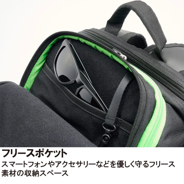Backpack with a green-zip fleece-lined pocket holding sunglasses and small accessories for protection and easy access.