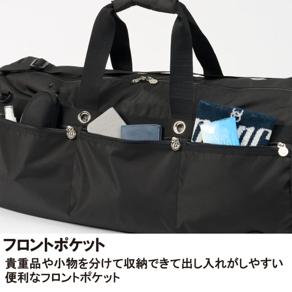 Black duffel bag with three front pockets showing a phone, wallet, and small items.