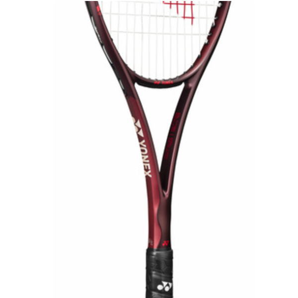 Close-up of a maroon Yonex tennis racket with a black grip and visible strings above the throat.