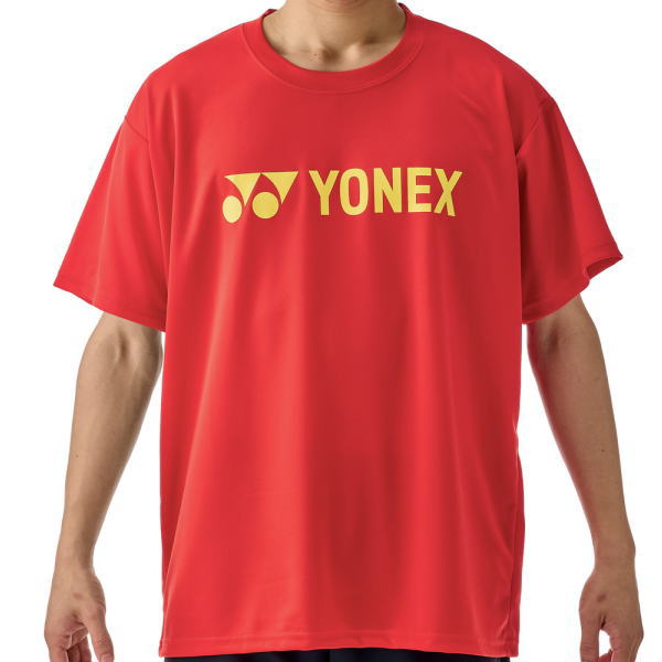 Man wearing a red Yonex T-shirt with a yellow Yonex logo on the chest (front view).