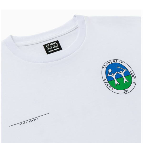 White t-shirt featuring a circular Yonex Community Center logo on the chest and a