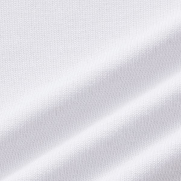 Close-up of white fabric with a diagonal fold and fine knit texture