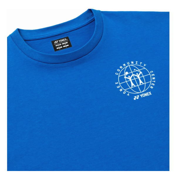 Blue t-shirt with a white circular logo on the left chest: the words 'Community Center' around a globe and Yonex branding and a small athlete figure inside the circle.