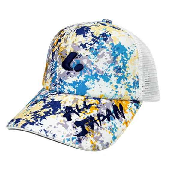 Colorful paint-splatter baseball cap with a white mesh back; front reads 'Dream Team' in black letters.
