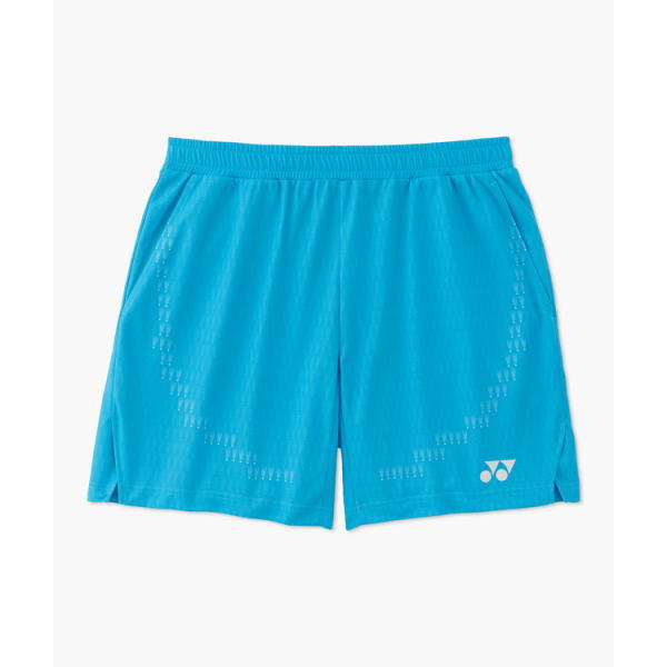 Blue athletic shorts with an elastic waistband, subtle dashed curved patterns along the sides, and a small Yonex logo at the bottom-right leg.