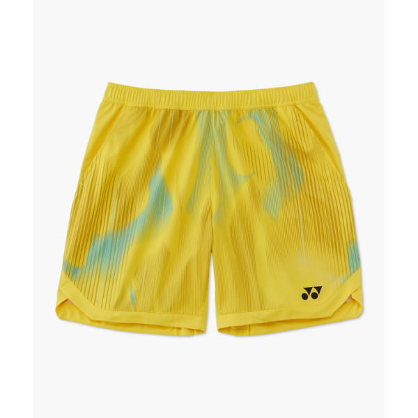 Bright yellow athletic shorts with abstract blue-green dye pattern and a small black logo at the hem.