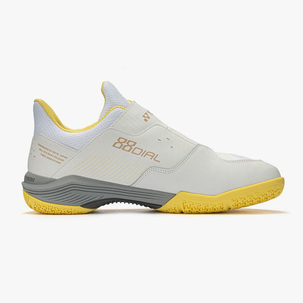 Side view of a white and light gray athletic sneaker with yellow accents and a yellow outsole.