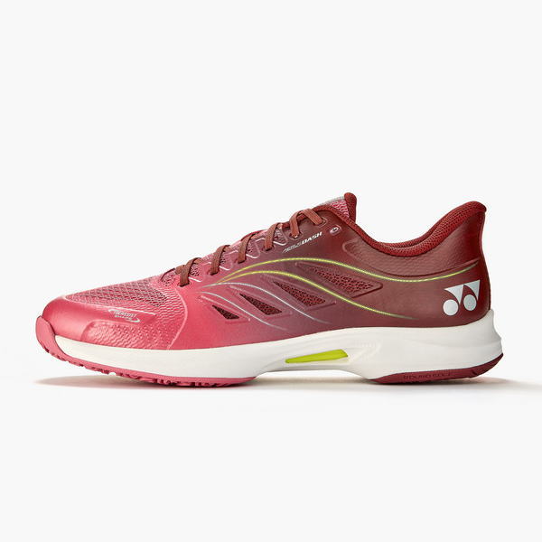 Red to pink gradient running shoe with a white midsole, lime accent, and Yonex logo on the heel.