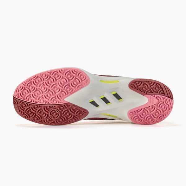 Athletic shoe outsole with pink rubber treads, white midsole, and neon yellow accents; features three black stripes in the center as branding detail.