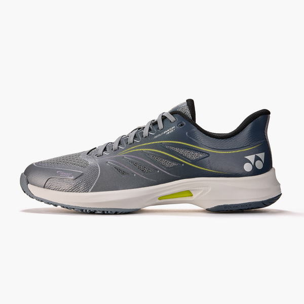 Gray-blue running shoe shown from the side with a white midsole and lime accent stripe.