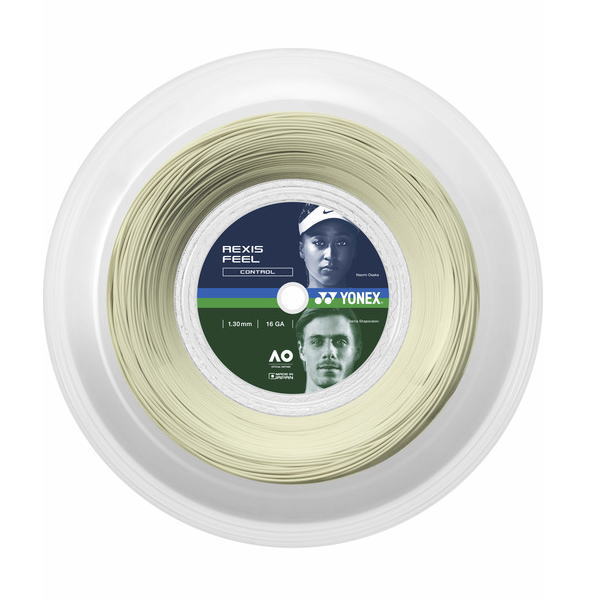 Spool of pale yellow Yonex tennis string on a white reel, labeled with 'Apex Feel' and 'Control' on a dark circular label.
