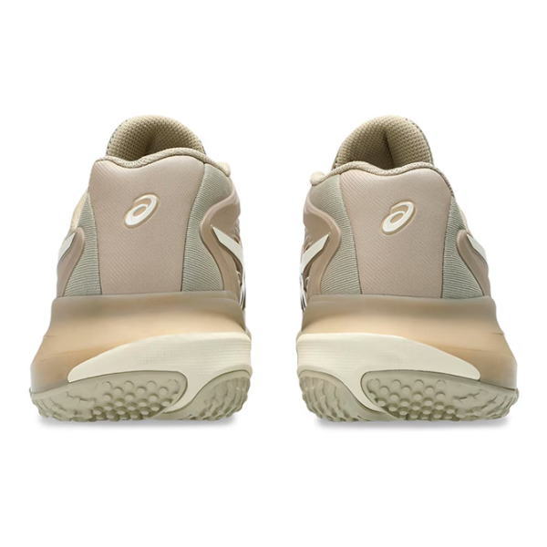 Rear view of beige ASICS running shoes showing heel counter and thick, two-tone midsole with textured outsole; beige and light gray panels visible.