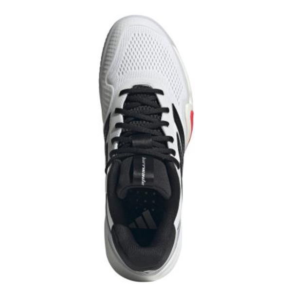 Top-down view of a white running shoe with black laces and black interior lining.