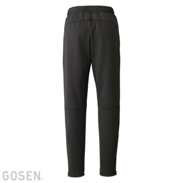 Back view of black athletic pants with an elastic waistband and tapered legs.