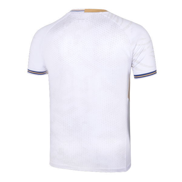 White back view of a short-sleeve sports jersey with subtle dotted pattern and blue-gold trim on the cuffs and collar edges