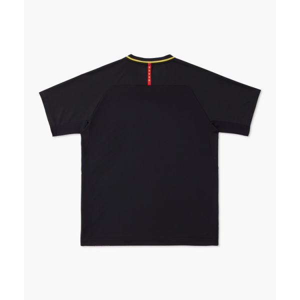 Back view of a black short-sleeve polo shirt with a yellow collar trim and a red back neck tab.
