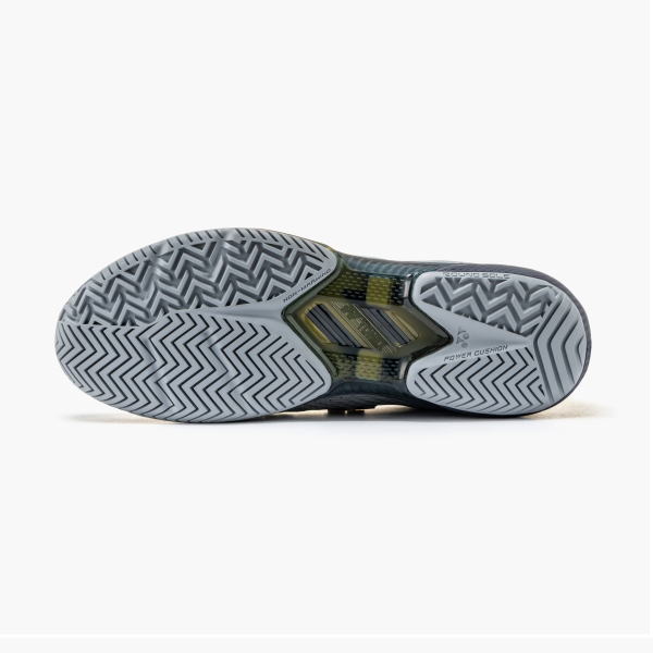 Bottom view of a gray athletic shoe outsole with herringbone/chevron tread and visible midsole cushioning.